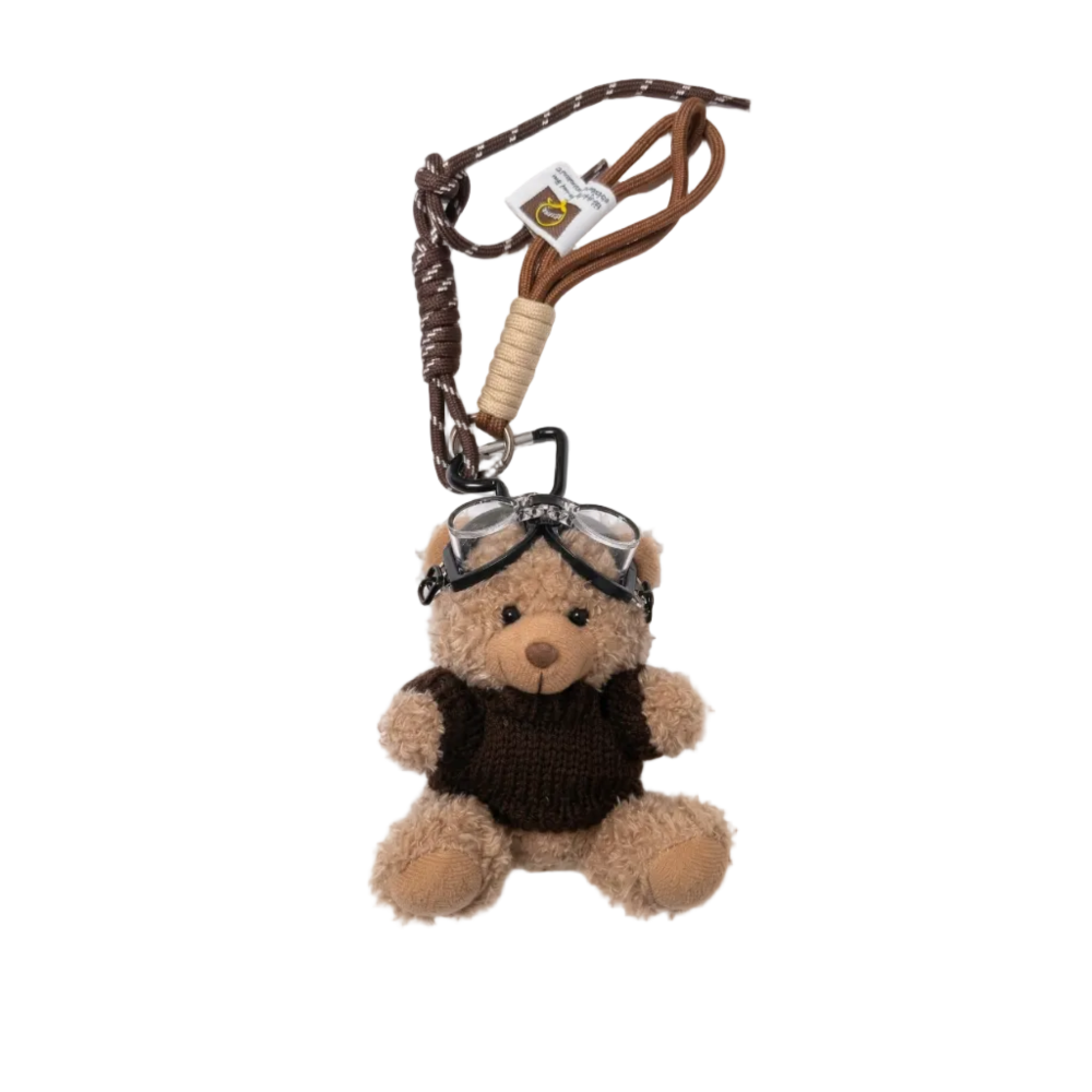Teddy bear keychain with glasses and a leash on a white background
