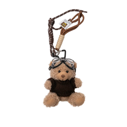 Teddy bear keychain with glasses and a leash on a white background